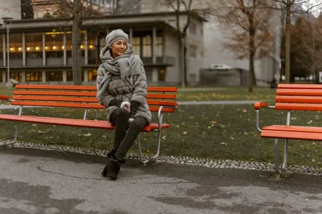 lady at bus stop